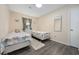 Charming bedroom with two twin beds, soft lighting, and a cozy atmosphere at 1210 N Ocean Blvd. # 105, Surfside Beach, SC 29575