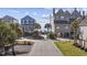 Charming beach houses on a quiet street offer a tranquil coastal living experience with ocean access at 1210 N Ocean Blvd. # 105, Surfside Beach, SC 29575