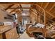 Unfinished attic space with exposed rafters, stored items, and overhead lighting at 156 Henry Middleton Blvd., Myrtle Beach, SC 29588