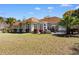 Expansive backyard featuring a well-maintained lawn, a patio, and lovely landscaping at 156 Henry Middleton Blvd., Myrtle Beach, SC 29588