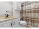 Bathroom featuring white vanity and toilet with enclosed shower and bathtub at 156 Henry Middleton Blvd., Myrtle Beach, SC 29588