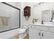 Bathroom featuring tub/shower combo with sliding glass door, white vanity, and toilet at 156 Henry Middleton Blvd., Myrtle Beach, SC 29588