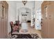 Inviting home entrance showcasing tile floors, decorative rug, chandelier and an open floor plan at 156 Henry Middleton Blvd., Myrtle Beach, SC 29588