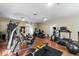 Bright fitness center with modern exercise equipment and wood floor at 156 Henry Middleton Blvd., Myrtle Beach, SC 29588