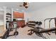 Workout room featuring workout equipment, a ceiling fan, and a kitchenette at 156 Henry Middleton Blvd., Myrtle Beach, SC 29588