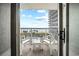 Relax on this private balcony with seating, offering stunning ocean and resort views at 161 Seawatch Dr. # 410, Myrtle Beach, SC 29572
