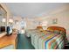 Comfortable bedroom featuring two beds, a TV, and access to a balcony with ocean views at 161 Seawatch Dr. # 410, Myrtle Beach, SC 29572