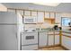 Kitchen with white appliances at 161 Seawatch Dr. # 410, Myrtle Beach, SC 29572