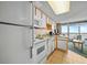 Bright kitchen with full-sized refrigerator and appliances at 161 Seawatch Dr. # 410, Myrtle Beach, SC 29572