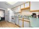 Functional kitchen with white appliances, ample cabinet space, and tile flooring at 161 Seawatch Dr. # 410, Myrtle Beach, SC 29572