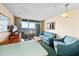 Bright living area with ocean view balcony, comfortable seating, and dining space, perfect for relaxing and enjoying the scenery at 161 Seawatch Dr. # 410, Myrtle Beach, SC 29572