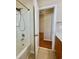 Bathroom showing a bathtub and shower and a view of the sink and toilet at 1612 Fairforest Ct., Conway, SC 29526