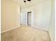 This bedroom offers neutral decor, carpeted flooring, closet and a ceiling fan at 1612 Fairforest Ct., Conway, SC 29526