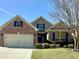 Charming brick home featuring blue shutters and a well-maintained lawn at 1612 Fairforest Ct., Conway, SC 29526