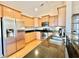 Updated kitchen with stainless steel appliances, granite counters, and ample cabinet space at 1612 Fairforest Ct., Conway, SC 29526