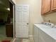 Functional laundry area with a washer, dryer, and access to the garage at 1612 Fairforest Ct., Conway, SC 29526