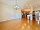 Bright and spacious interior showcasing hardwood floors and open concept kitchen at 1612 Fairforest Ct., Conway, SC 29526