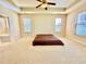 Main bedroom showing bathroom access, ceiling fan, and plenty of natural light at 1612 Fairforest Ct., Conway, SC 29526