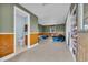 Finished basement with carpet, wainscotting, and an attached bathroom with toilet and sink at 1631 27Th Ave. N, North Myrtle Beach, SC 29582