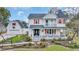 Inviting two-story home with a charming porch and well-maintained landscaping at 1631 27Th Ave. N, North Myrtle Beach, SC 29582