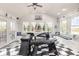 Bright breakfast nook with bench seating, checkerboard floors, and plenty of natural light at 1644 South Waccamaw Dr., Murrells Inlet, SC 29576