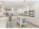Bright kitchen with stainless steel appliances, a center island, and plenty of cabinet space at 1644 South Waccamaw Dr., Murrells Inlet, SC 29576