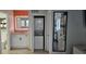 Functional bathroom with a stacked washer and dryer, vanity, and well-lit mirror at 218 Double Eagle Dr., Surfside Beach, SC 29575