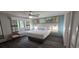 Inviting bedroom featuring a comfy bed, bedside tables, and coastal-themed decorations at 218 Double Eagle Dr., Surfside Beach, SC 29575