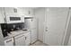 Compact kitchenette featuring modern appliances and ample counter space at 218 Double Eagle Dr., Surfside Beach, SC 29575