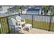 Outdoor patio with white chairs and a view of the backyard at 218 Double Eagle Dr., Surfside Beach, SC 29575
