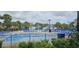 Spacious outdoor pool with ample seating and a variety of water features for Gathering fun and relaxation at 218 Double Eagle Dr., Surfside Beach, SC 29575