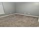 Bedroom with neutral carpet and gray walls, showcasing a blank canvas for personalization at 221 Black Bear Rd., Myrtle Beach, SC 29588