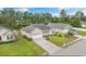 Charming single-story home with a well-manicured lawn, two-car garage, and mature landscaping at 221 Black Bear Rd., Myrtle Beach, SC 29588