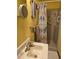 Compact bathroom with a shower, toilet, and mirror over the vanity, and coordinated towels at 2240 Jackson Circle, Little River, SC 29566