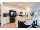 Modern kitchen with white cabinets, granite countertops, and stainless steel appliances at 228 Carolina Lakes Blvd., Myrtle Beach, SC 29588