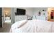 Bright main bedroom with white furniture, large dresser, and walk-in closet access at 228 Carolina Lakes Blvd., Myrtle Beach, SC 29588