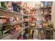 Walk-in pantry with extensive metal shelving providing plenty of room for food and other kitchen storage at 228 Carolina Lakes Blvd., Myrtle Beach, SC 29588