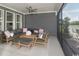 Inviting outdoor patio with comfortable seating perfect for relaxing and entertaining at 2404 Watershed Way, Longs, SC 29568