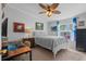 Charming bedroom featuring a ceiling fan, bright windows and stylish decor at 2405 Douglas St., North Myrtle Beach, SC 29582