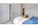 Comfortable bedroom featuring a blue bed with storage and double closets at 265 Mayflower Dr., Calabash, NC 28467