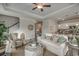 Bright living room with a white sofa, stylish decor, and an open floor plan at 265 Mayflower Dr., Calabash, NC 28467