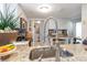 Well-equipped kitchen with stainless steel faucet, granite countertops, and modern appliances at 276 Salt Marsh Circle # 4D, Pawleys Island, SC 29585