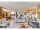 Open-concept living room and dining area with stylish furnishings and bright decor at 276 Salt Marsh Circle # 4D, Pawleys Island, SC 29585