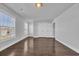 Spacious bedroom with hardwood floors, large windows, and closet at 2825 Stellar Loop, Myrtle Beach, SC 29577
