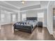 Spacious main bedroom suite with hardwood flooring, sitting area, and trey ceilings at 2825 Stellar Loop, Myrtle Beach, SC 29577