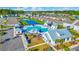 Aerial view of the community pool with seating areas, landscaping, and a serene atmosphere at 2825 Stellar Loop, Myrtle Beach, SC 29577