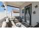 Comfortable seating area on back porch, creating a relaxing outdoor space with a view of the backyard at 294 Portofino Dr., Myrtle Beach, SC 29579