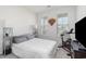 Bright bedroom with neutral colors, two windows, and a cozy atmosphere, perfect for relaxation at 294 Portofino Dr., Myrtle Beach, SC 29579