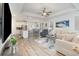Bright and open living area with a modern kitchen, dining space, and comfortable seating at 294 Portofino Dr., Myrtle Beach, SC 29579