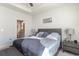 Inviting main bedroom with a comfortable bed, ceiling fan, and ensuite bathroom access at 294 Portofino Dr., Myrtle Beach, SC 29579